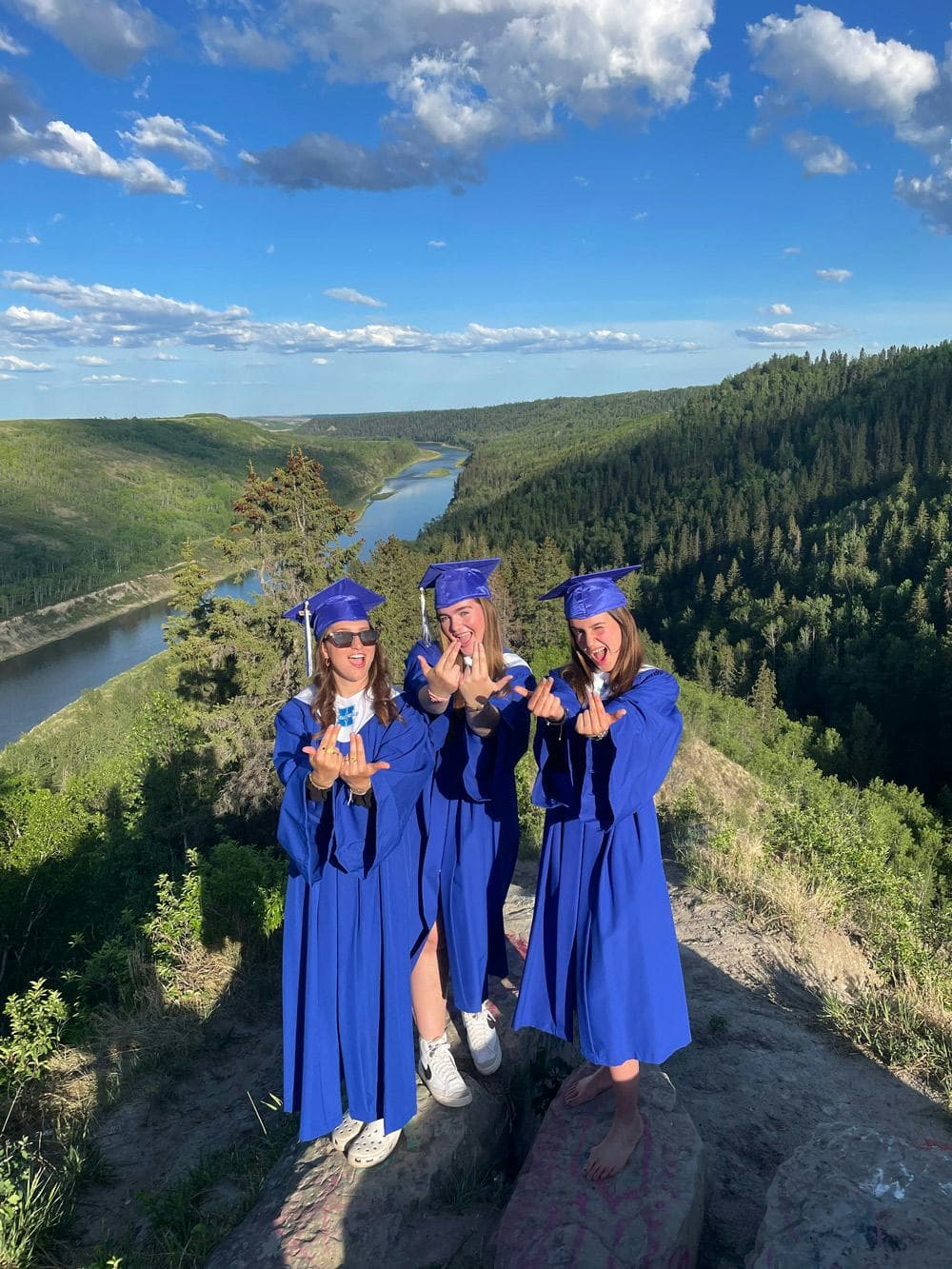 Students celebrating graduation after completing a school year in Canada as part of the Canadian school programme.
